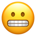 un emojis qui grimace